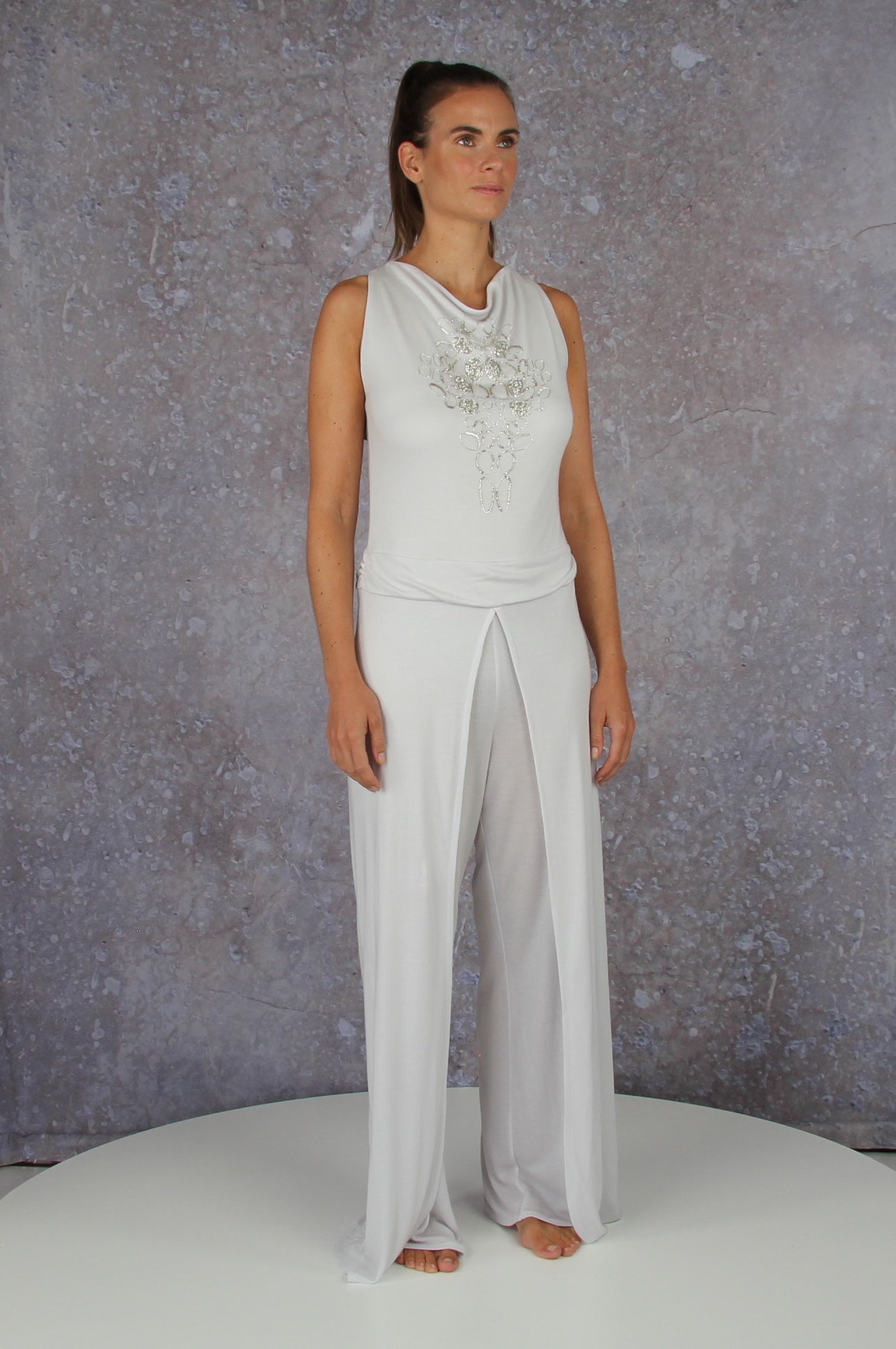 Soft falling jumpsuit with an embroidered waterfall collar