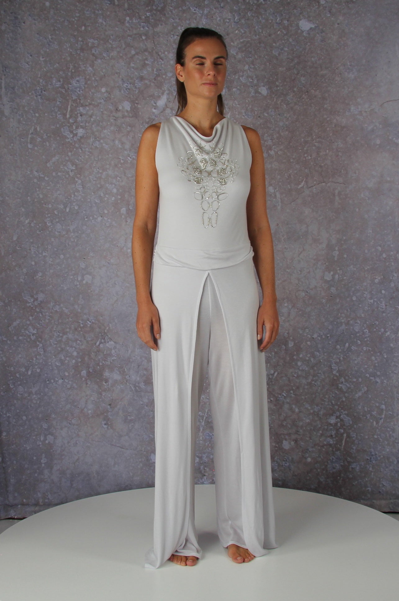 Soft falling jumpsuit with an embroidered waterfall collar
