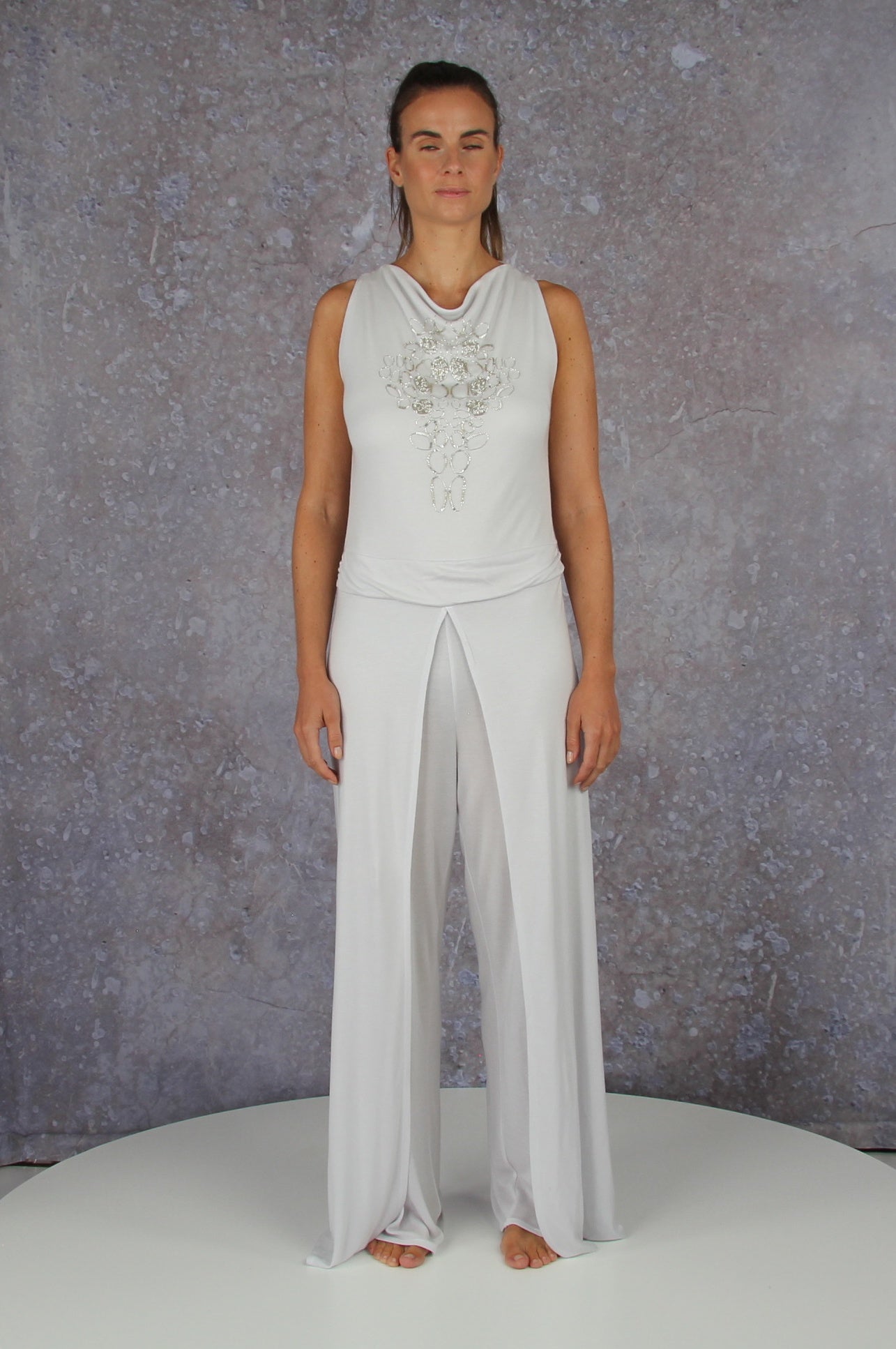 Soft falling jumpsuit with an embroidered waterfall collar