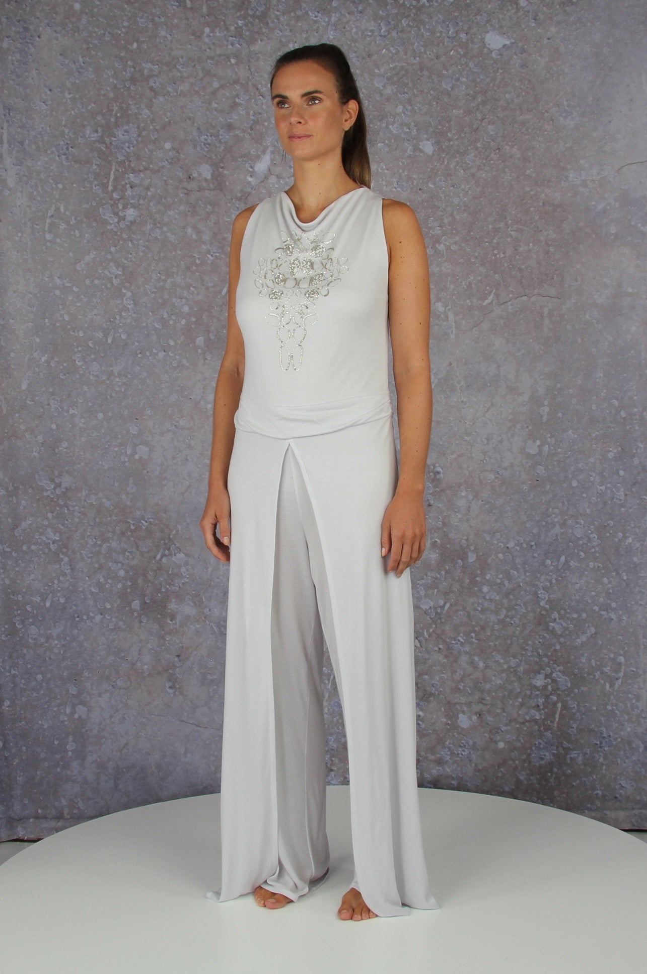 Soft falling jumpsuit with an embroidered waterfall collar