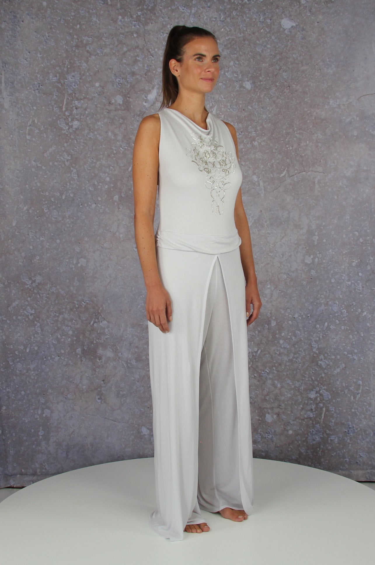 Soft falling jumpsuit with an embroidered waterfall collar
