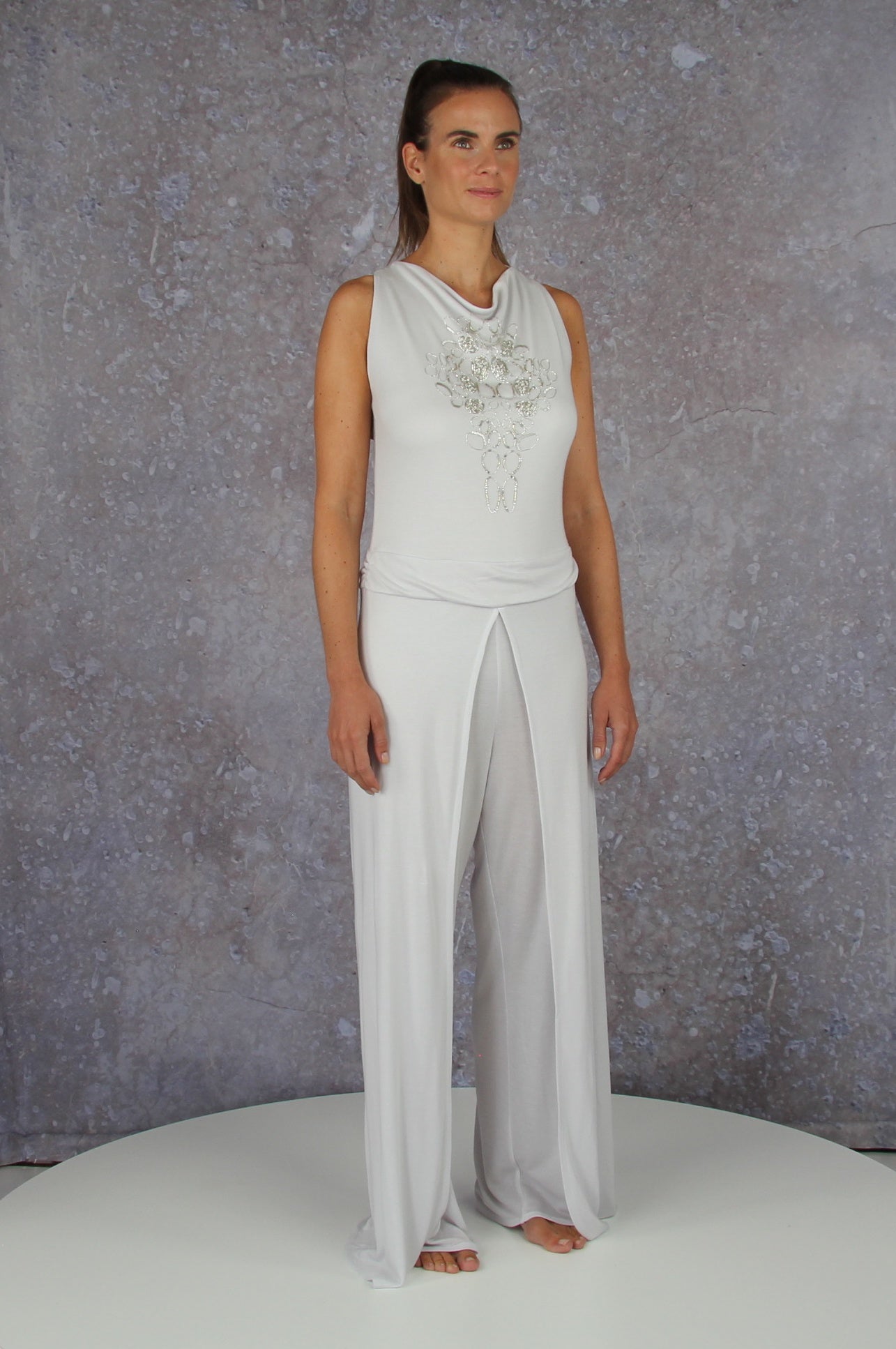 Soft falling jumpsuit with an embroidered waterfall collar