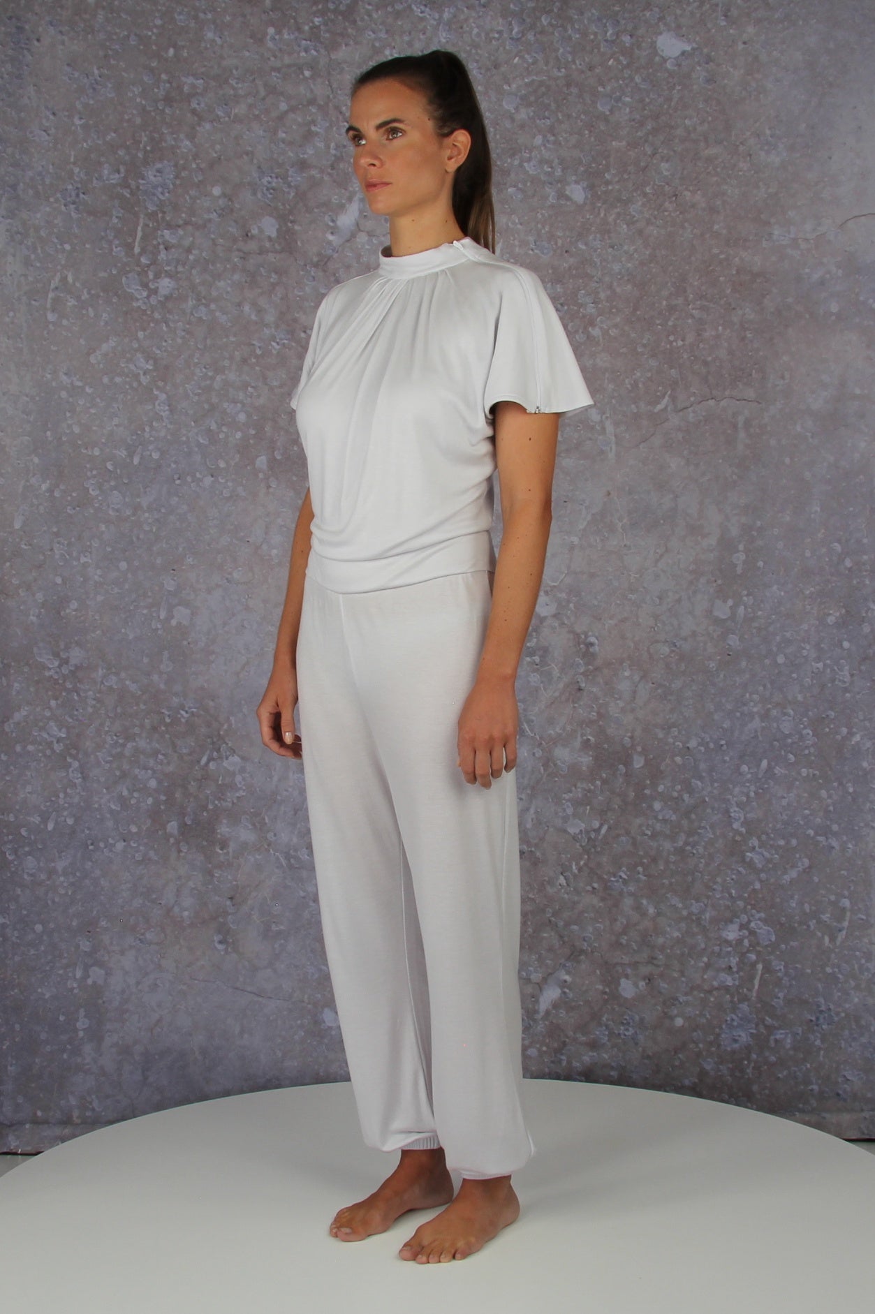 Unique model with a charming sleeve solution and stand-up collar