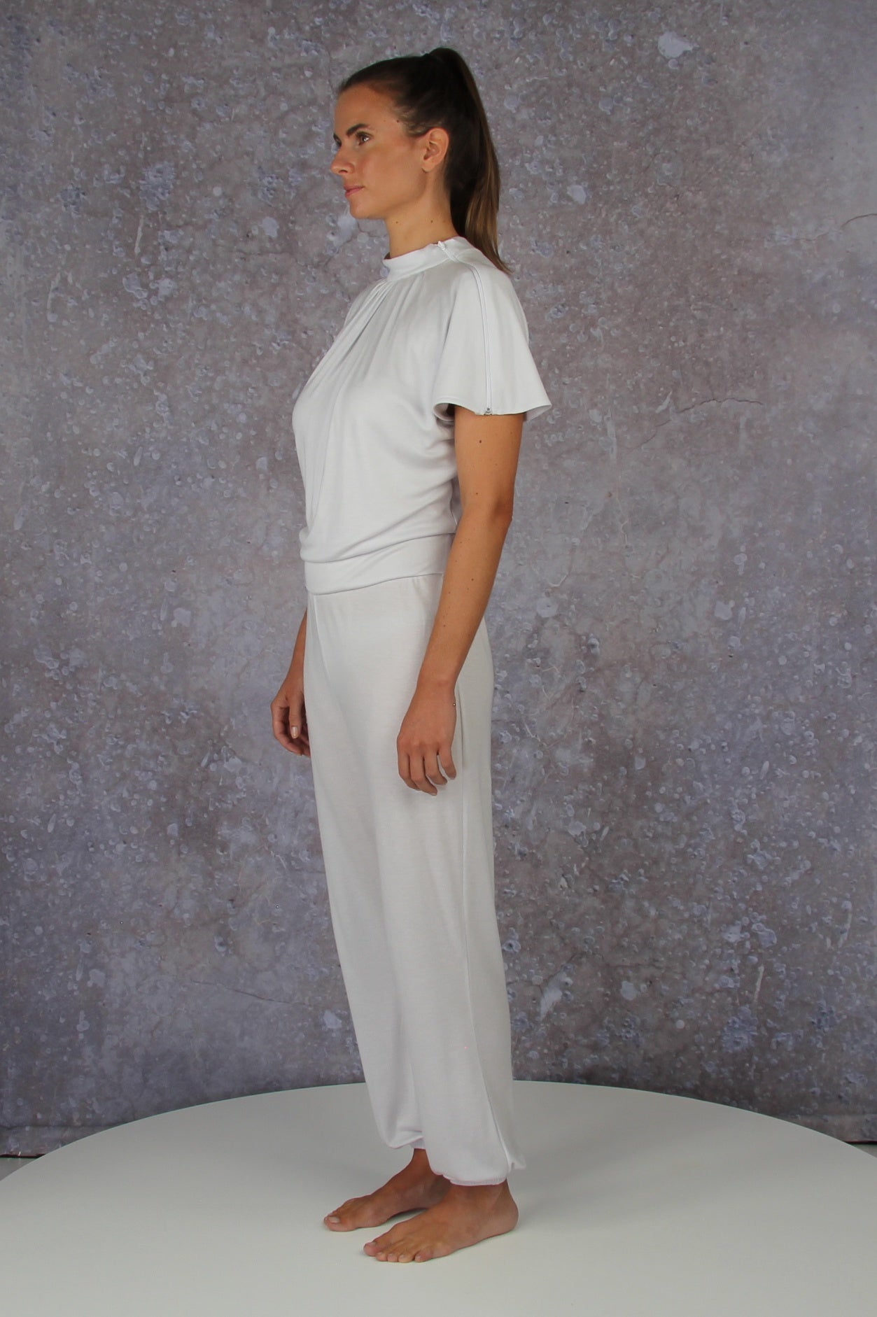 Unique model with a charming sleeve solution and stand-up collar