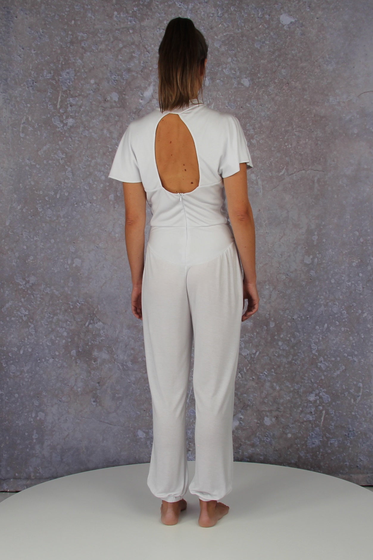 Unique model with a charming sleeve solution and stand-up collar