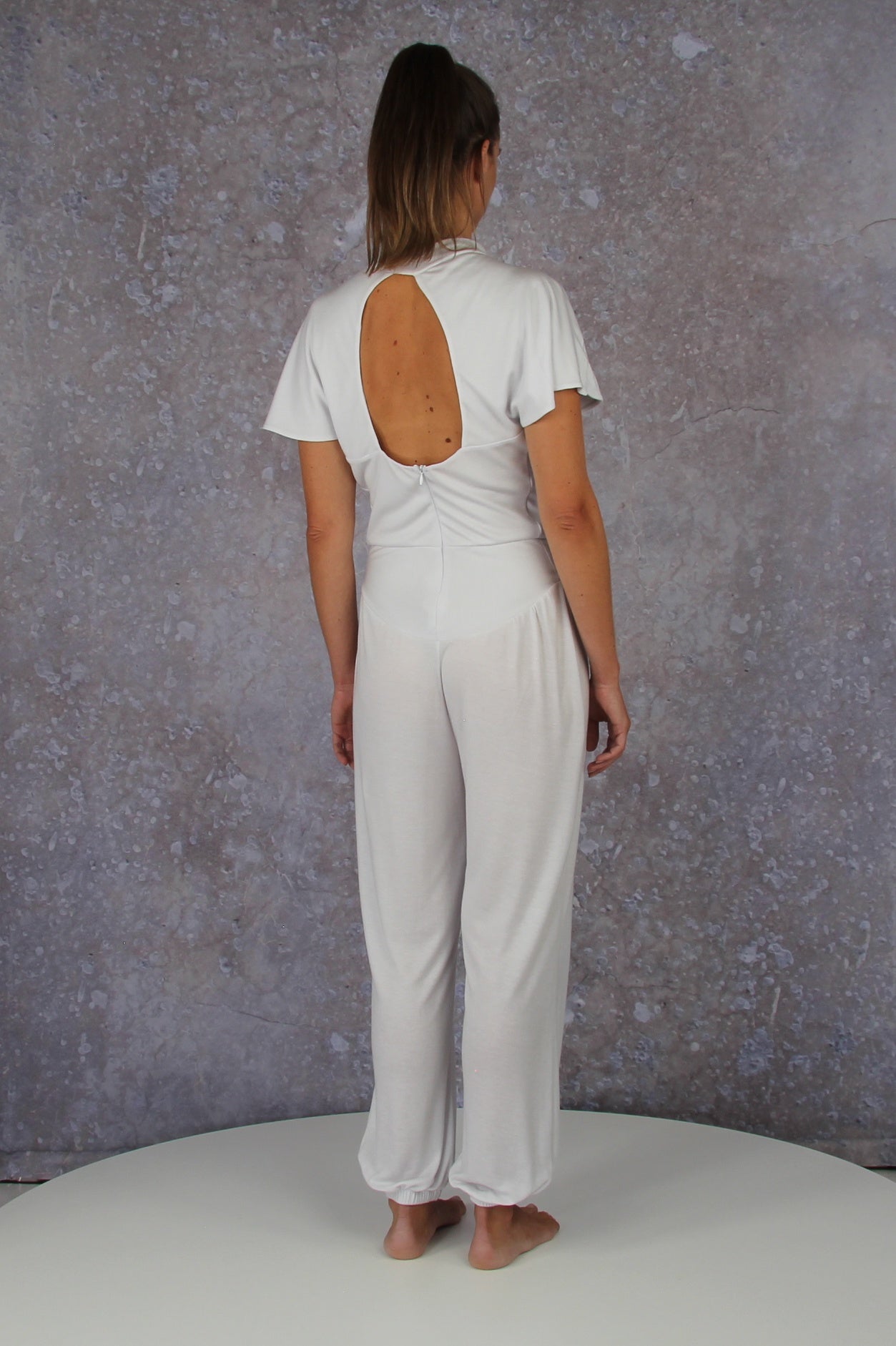 Unique model with a charming sleeve solution and stand-up collar