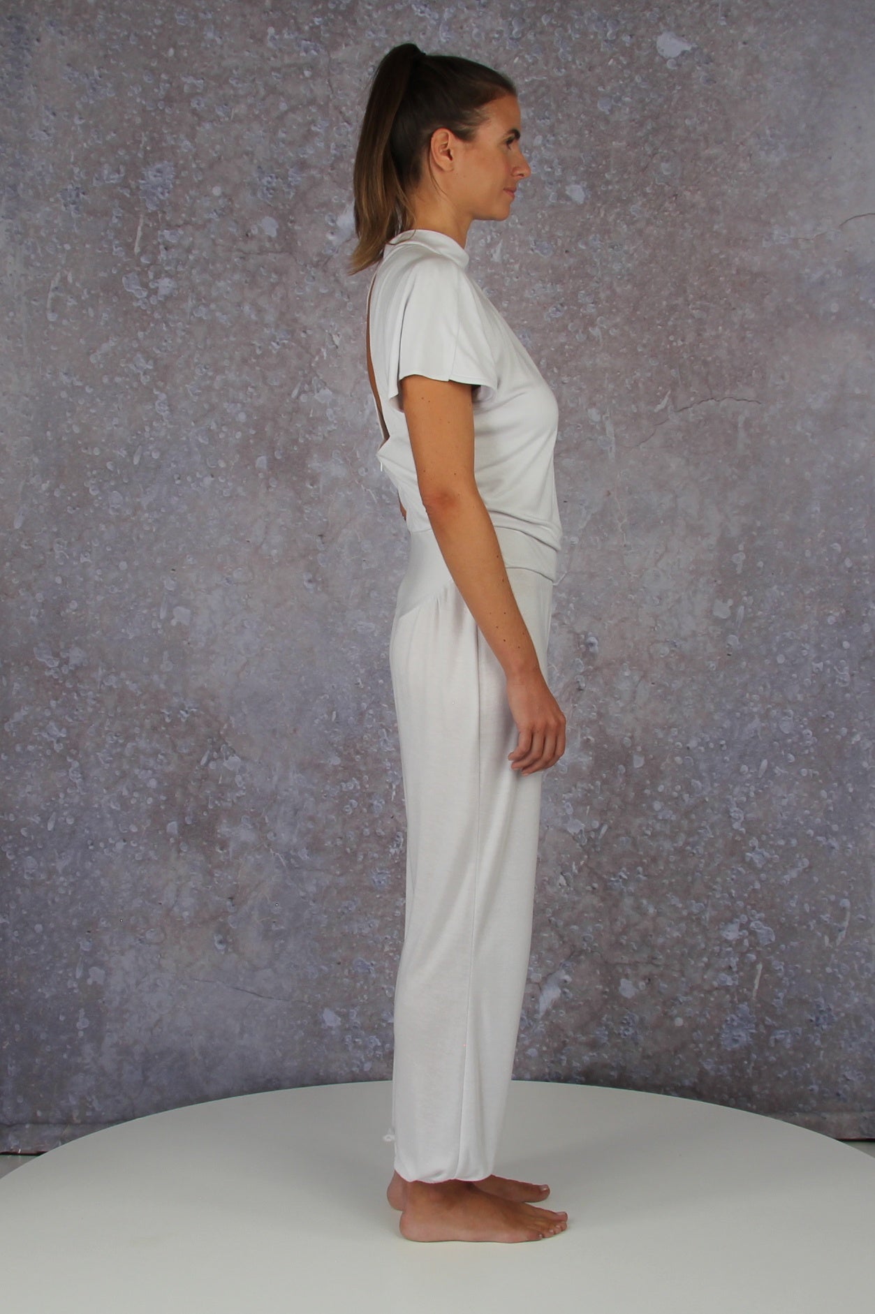 Unique model with a charming sleeve solution and stand-up collar