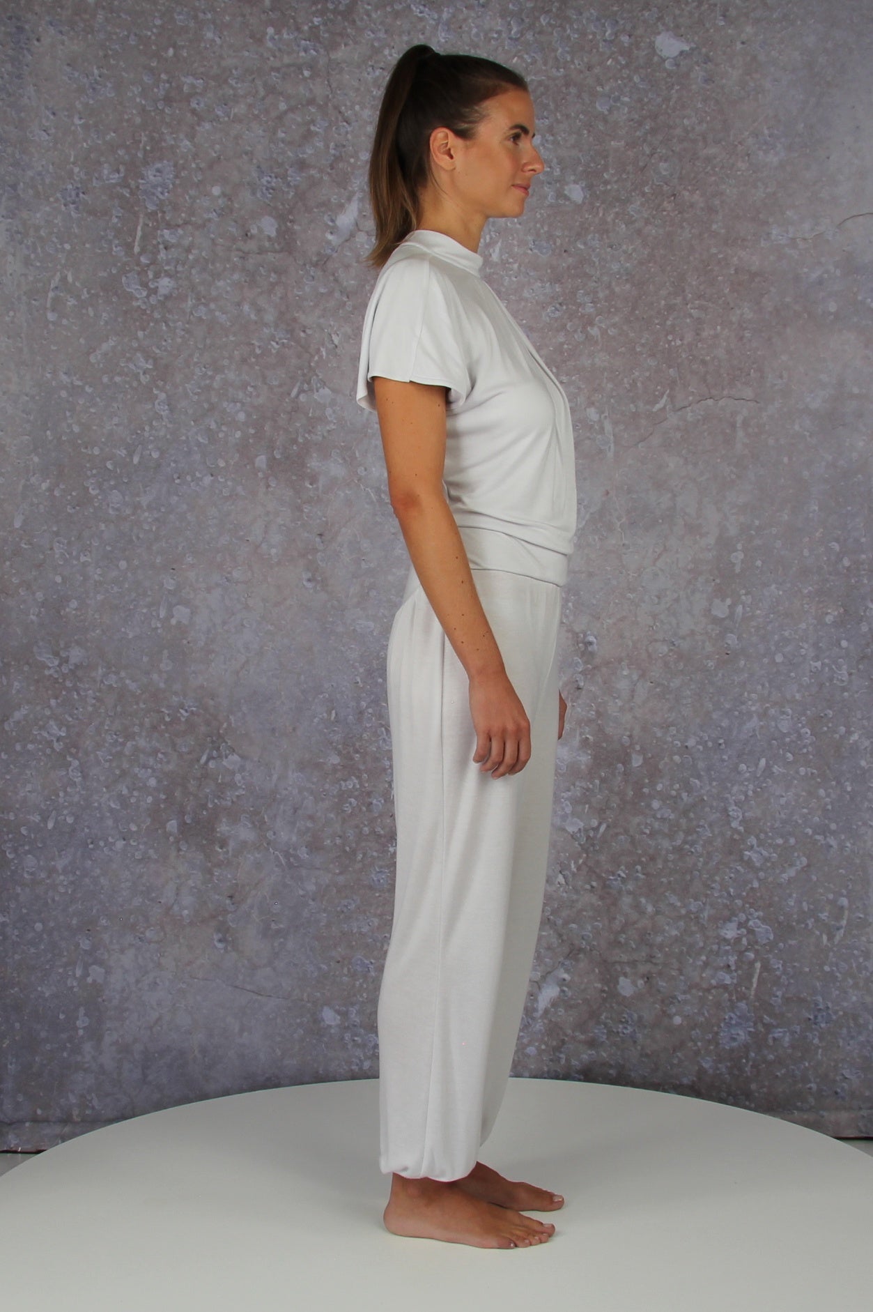 Unique model with a charming sleeve solution and stand-up collar