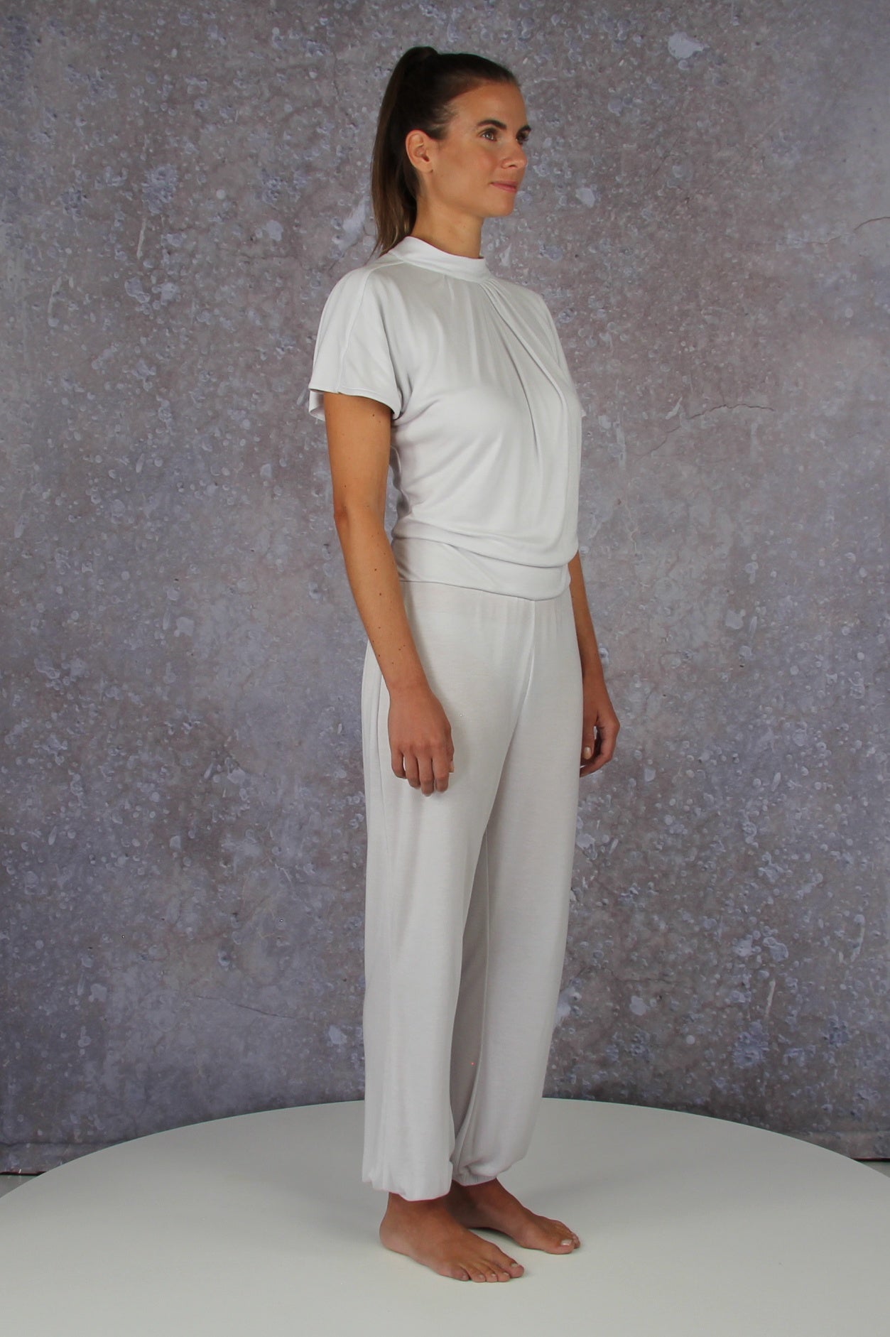 Unique model with a charming sleeve solution and stand-up collar