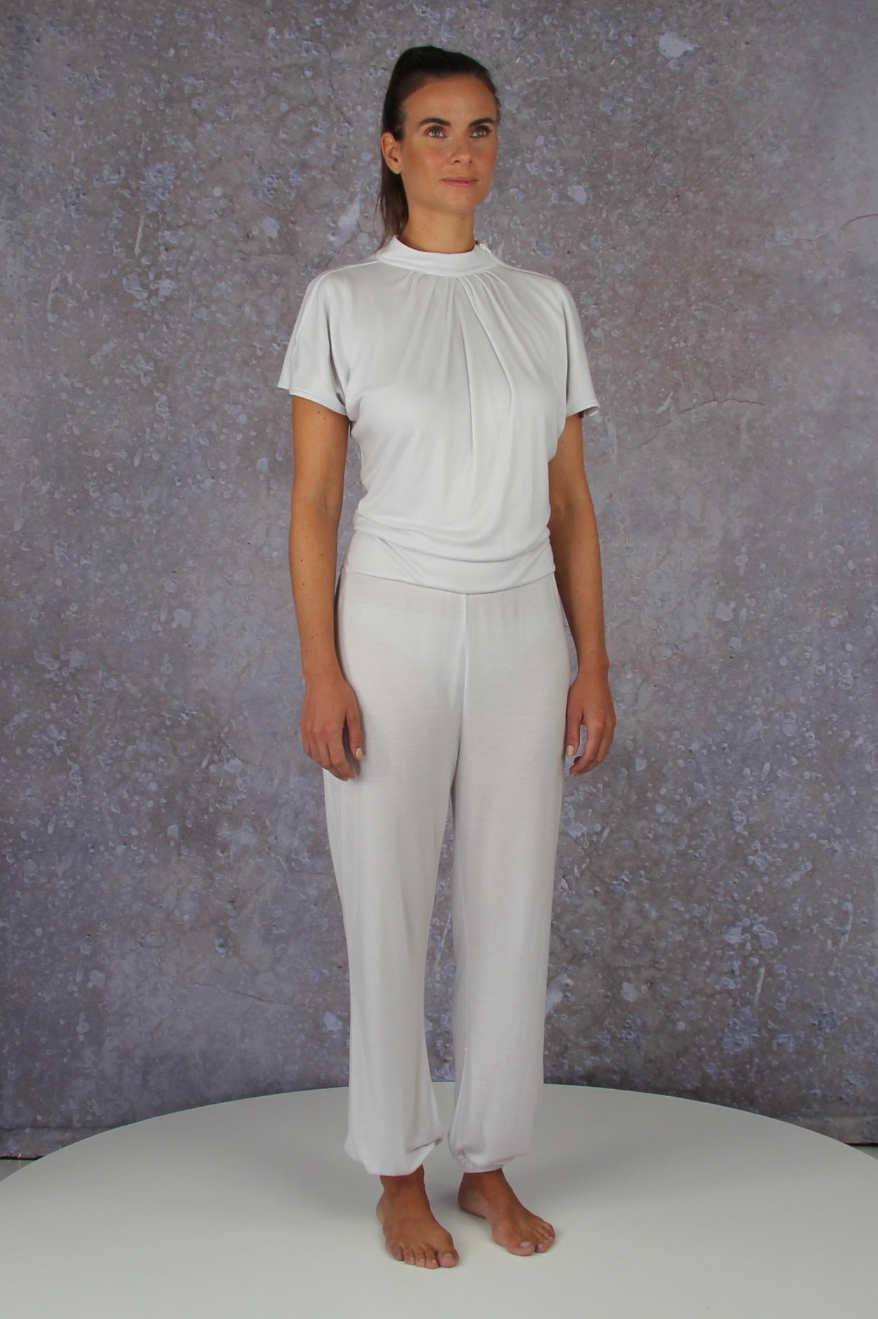 Unique model with a charming sleeve solution and stand-up collar