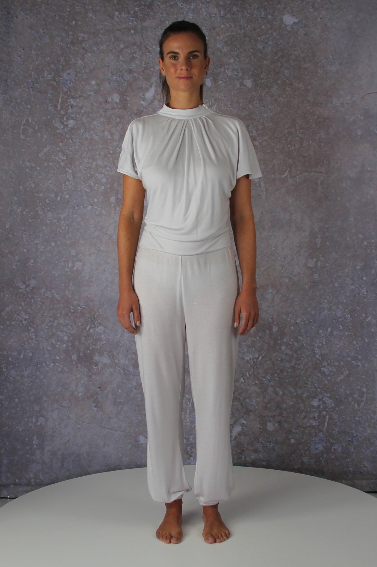 Unique model with a charming sleeve solution and stand-up collar