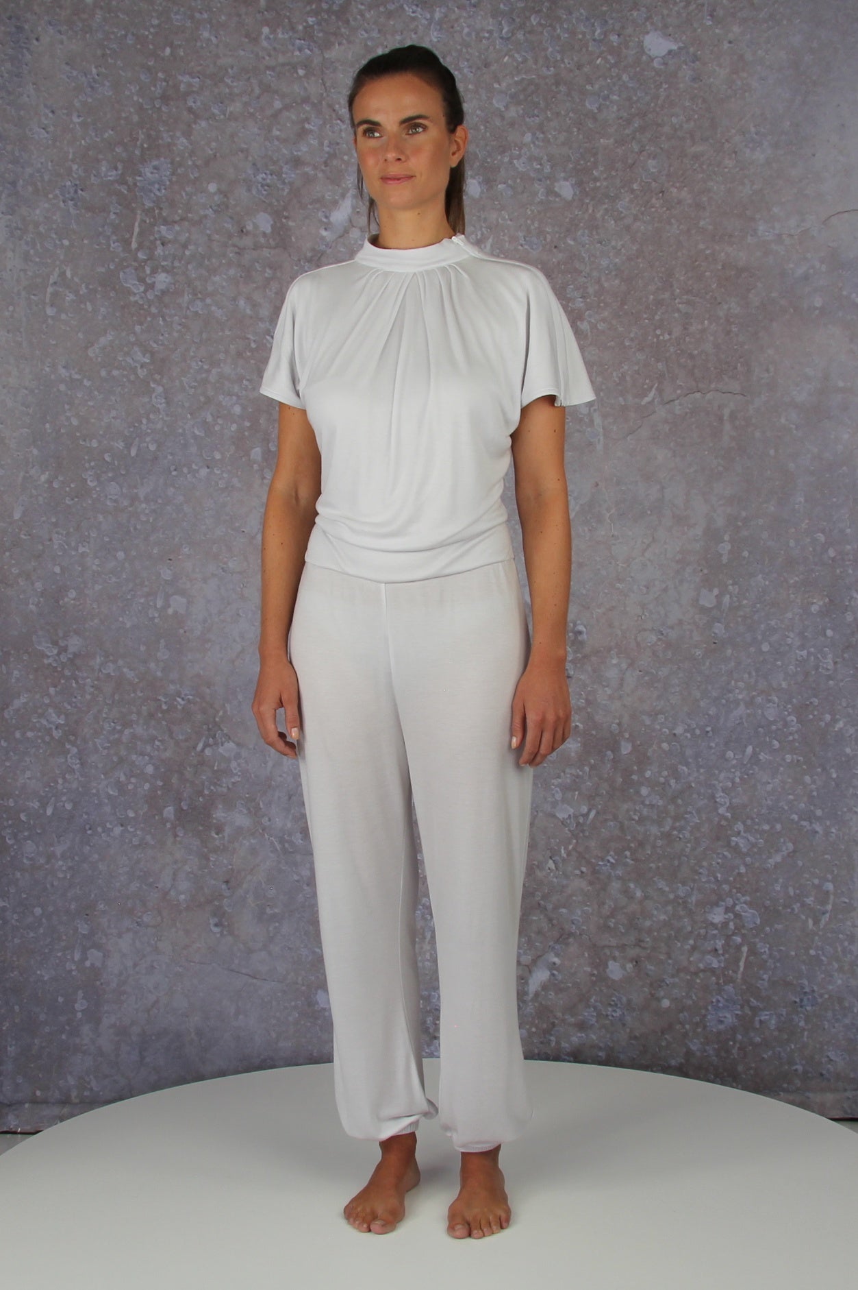 Unique model with a charming sleeve solution and stand-up collar